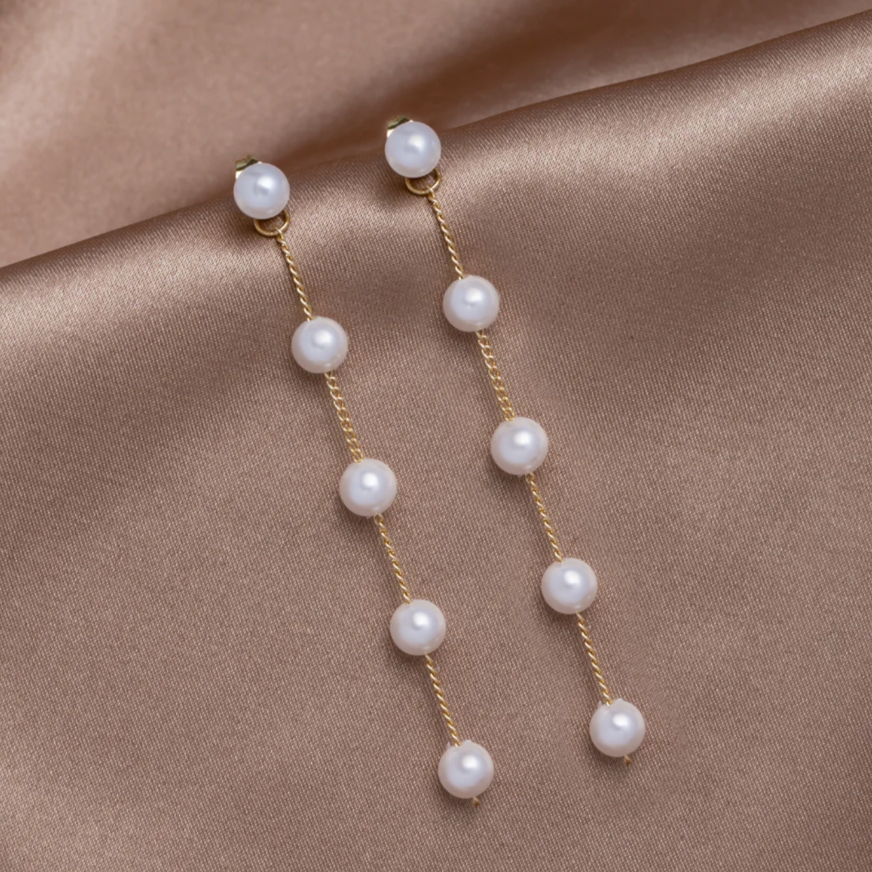 Dangling Freshwater Pearl Earrings in Gold