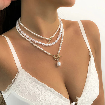 Gold Pearl love necklace