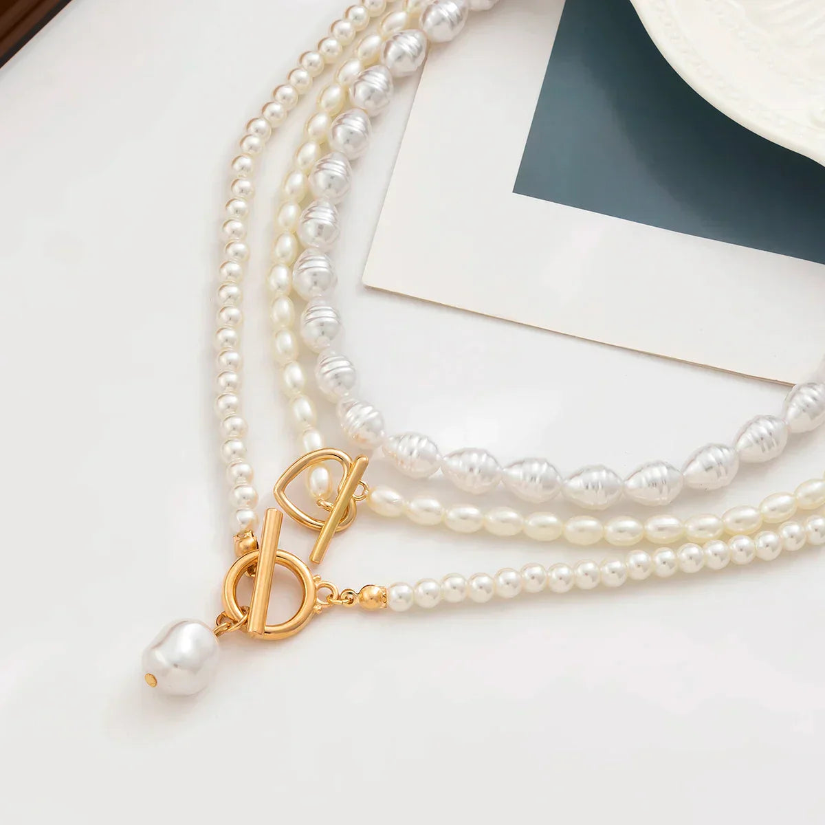 Gold Pearl love necklace