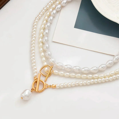 Gold Pearl love necklace