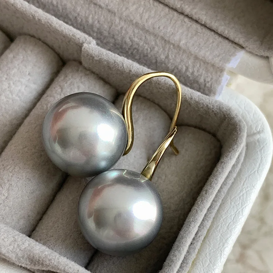 Gold and black pearl earrings